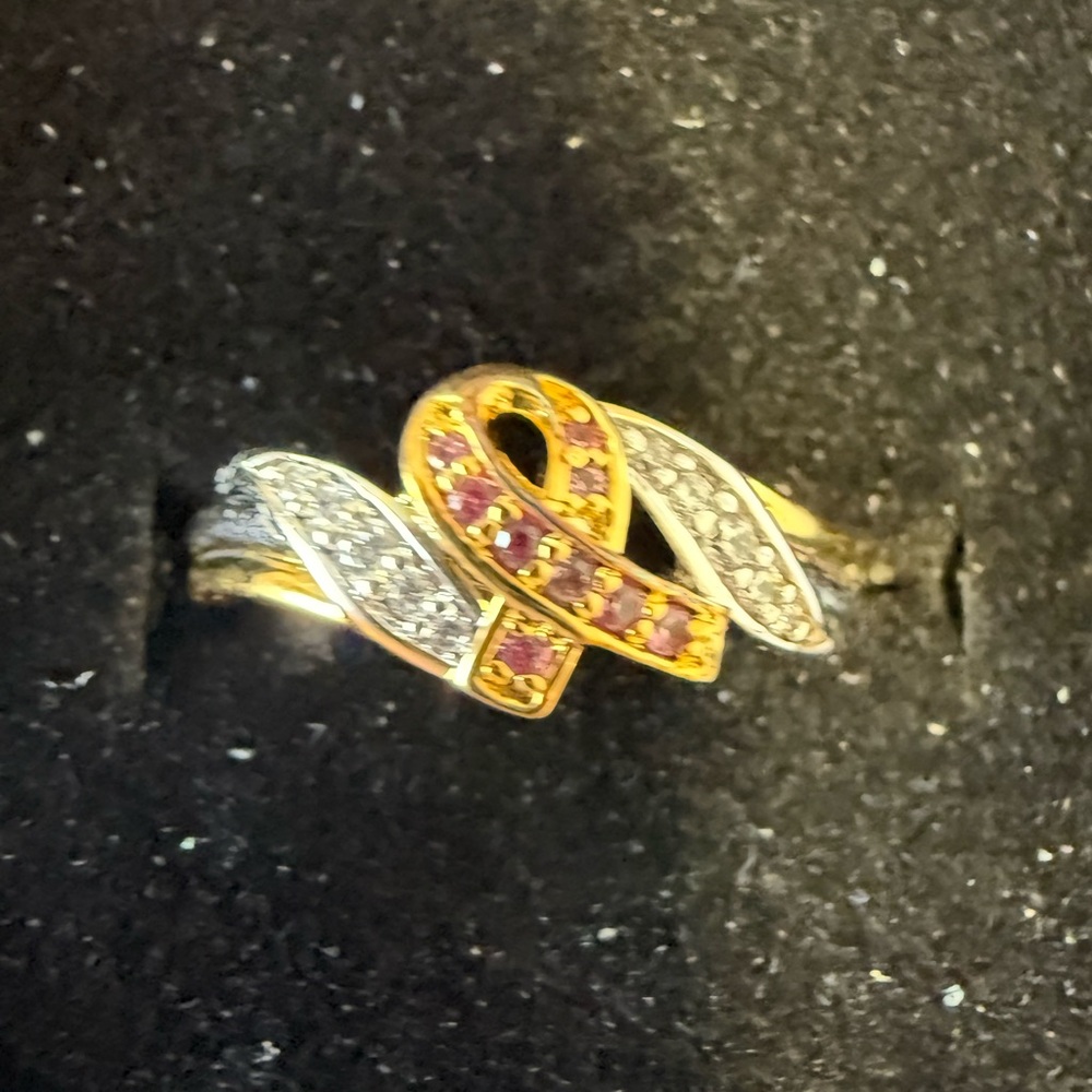 Elegant Gold and Silver ‘Breast Cancer Ribbon’ Ring. Size 9. Never been worn.